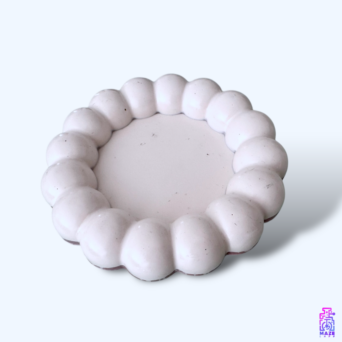 Angled top-side view of the BLOQ tray, highlighting its basic and minimalistic design with clean lines.
