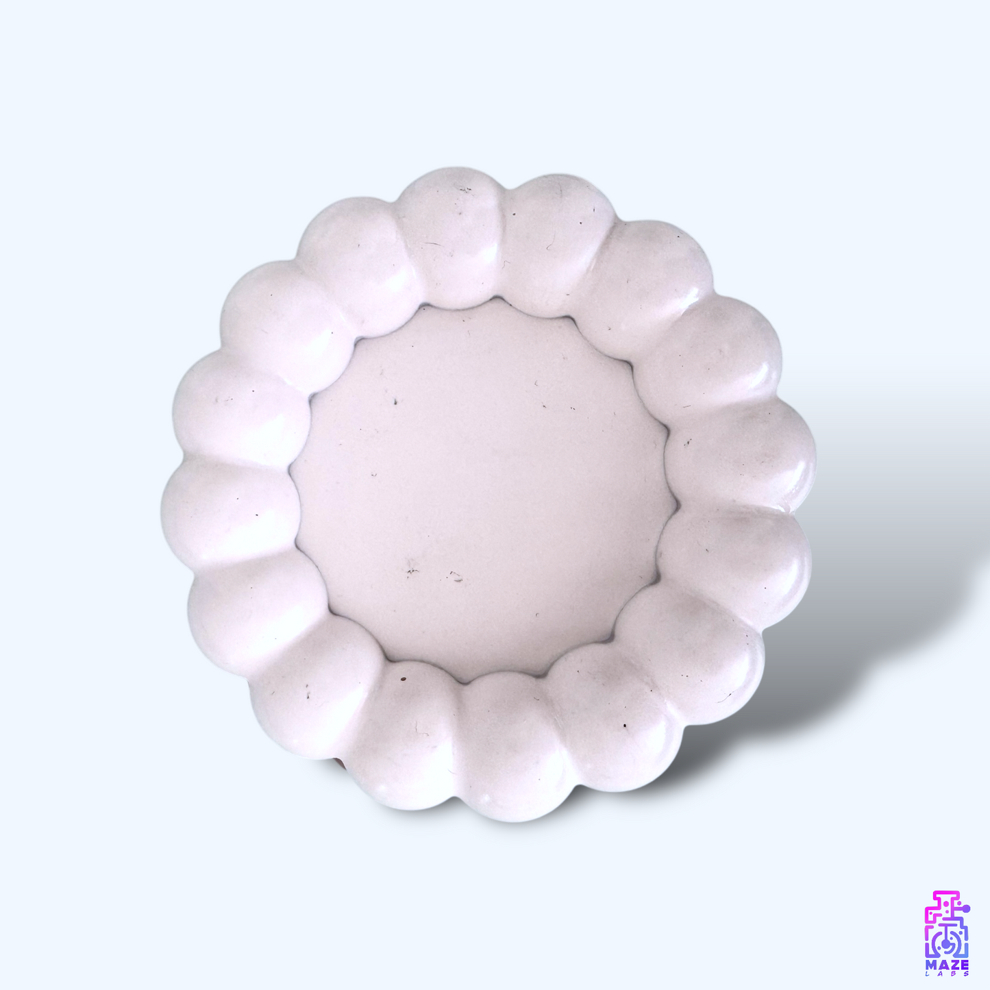 Flat top-down view of the BLOQ tray, emphasizing its smooth surface and refined finish.