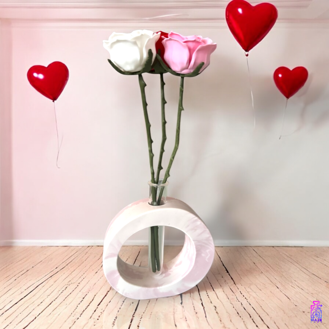 OHM vase displayed in a decorative setting with heart accents and floral arrangement.