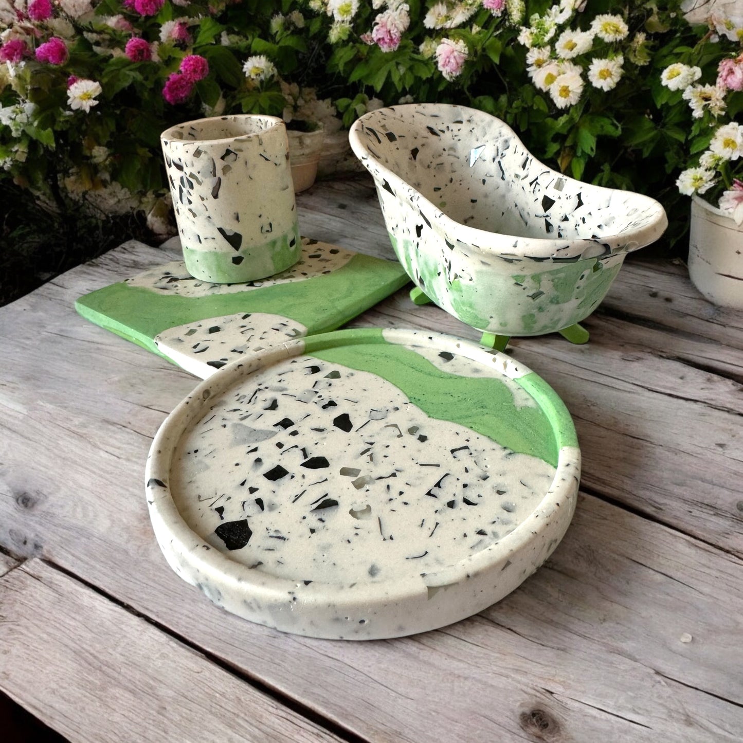 SOAK bathtub bowl styled with small accessories, ideal for bathroom organization.