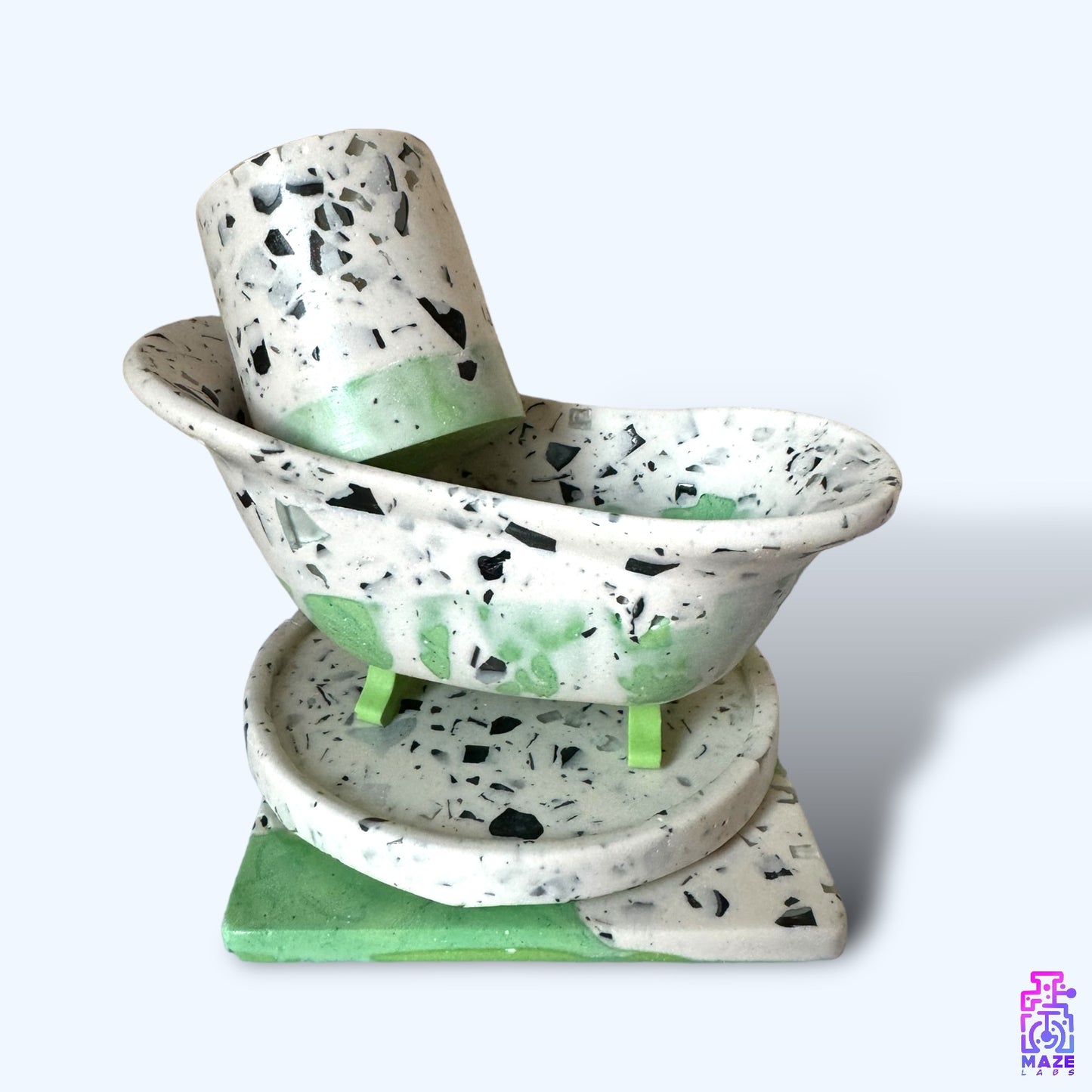 TUBA small vase displayed with other handmade jesmonite items, used as a functional organizer.