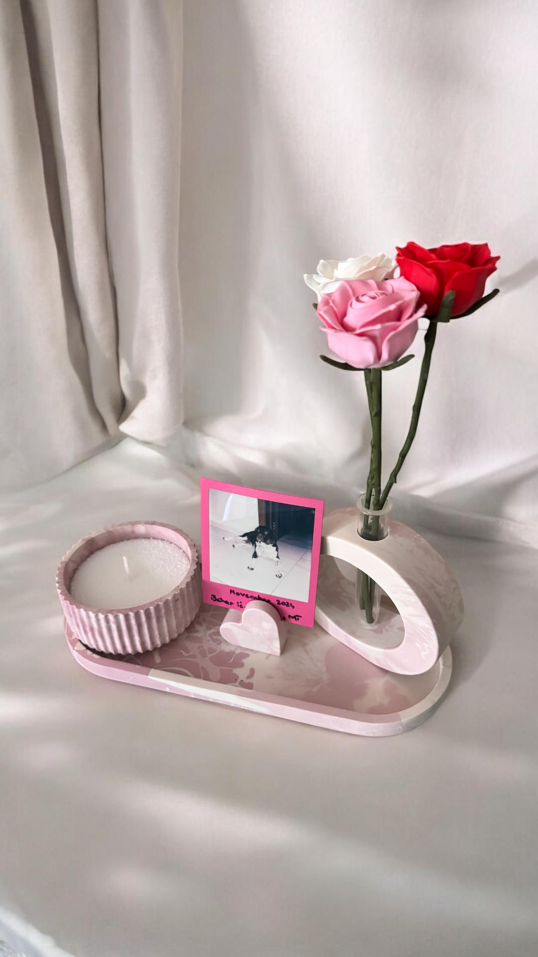 FLIK jesmonite jar displayed with a photo (Polaroid) holder, a vase and a tray, creating a beautiful home decor.