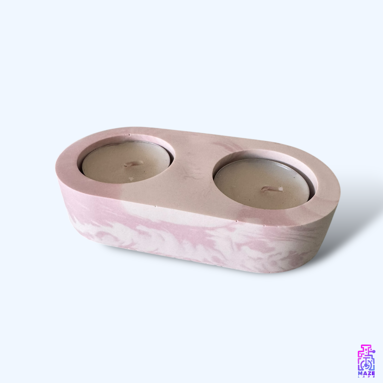 LUNO double tealight candle holder, handmade from eco-friendly jesmonite. Shown at an angle with two included candles, perfect for modern decor.