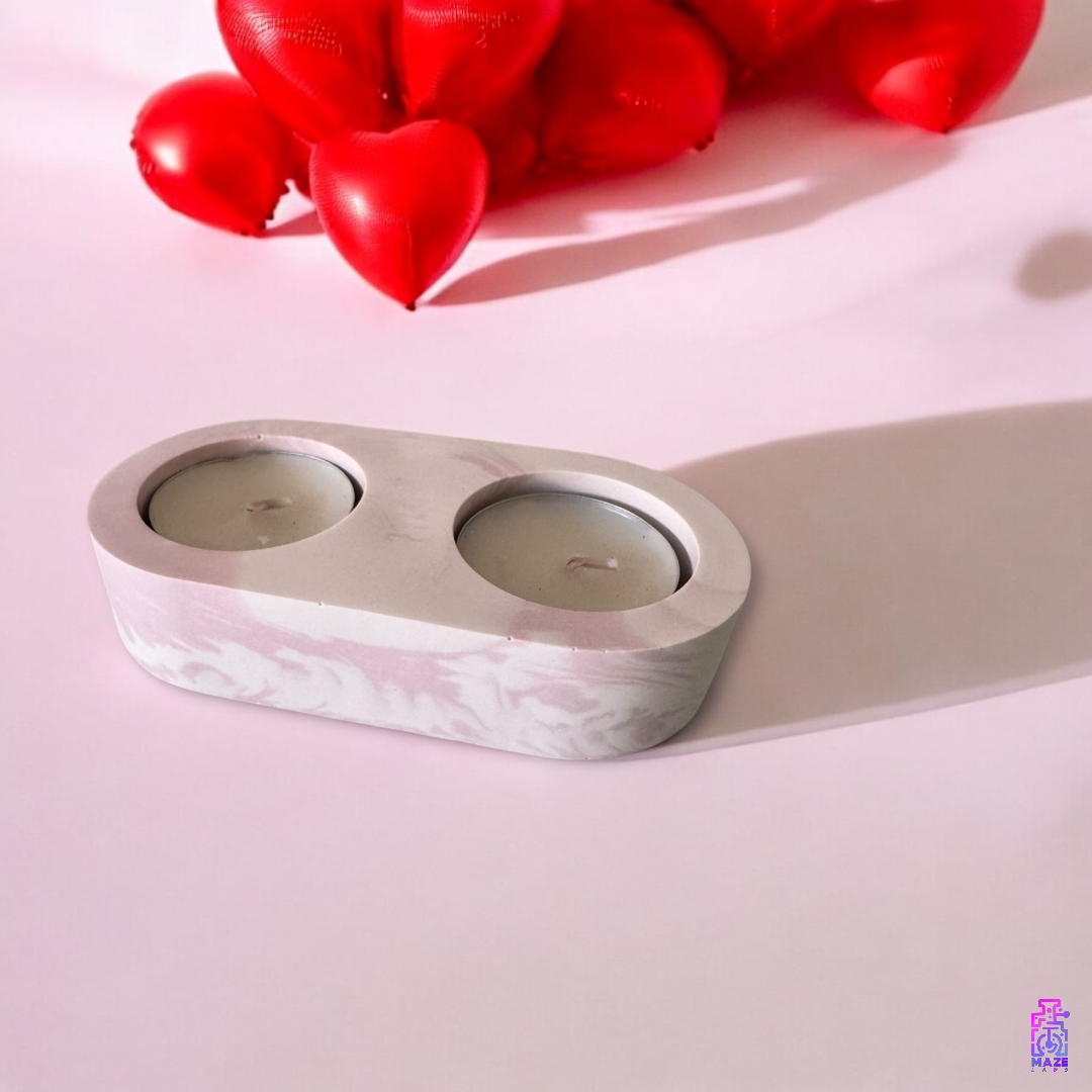 LUNO double tealight holder made from eco-friendly jesmonite, displayed on a soft pink background with red heart decorations, perfect for gifting.
