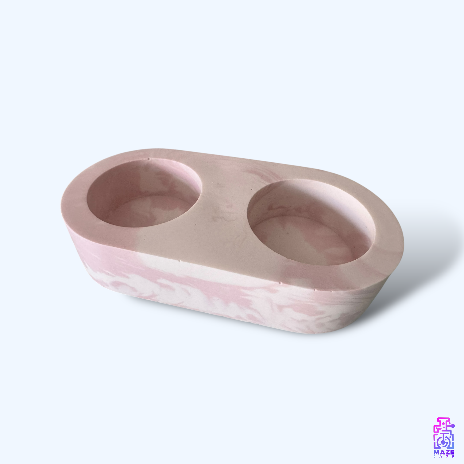 Side view of the LUNO double tealight holder, highlighting the smooth jesmonite texture and rounded design.