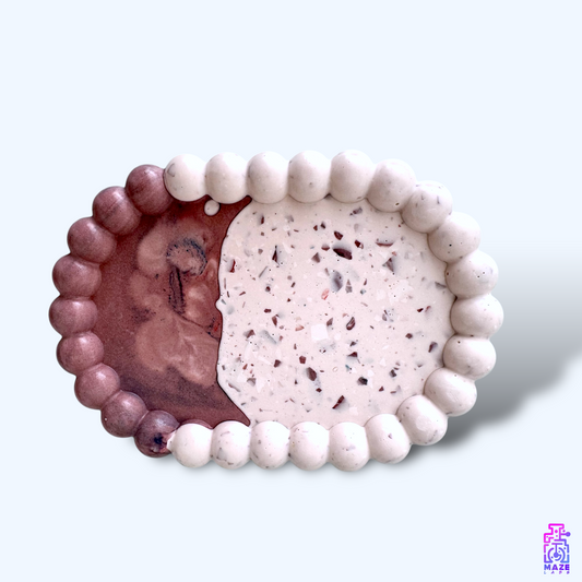 BLUQ oval tray made from eco-friendly jesmonite, featuring a bubbled edge and smooth surface.