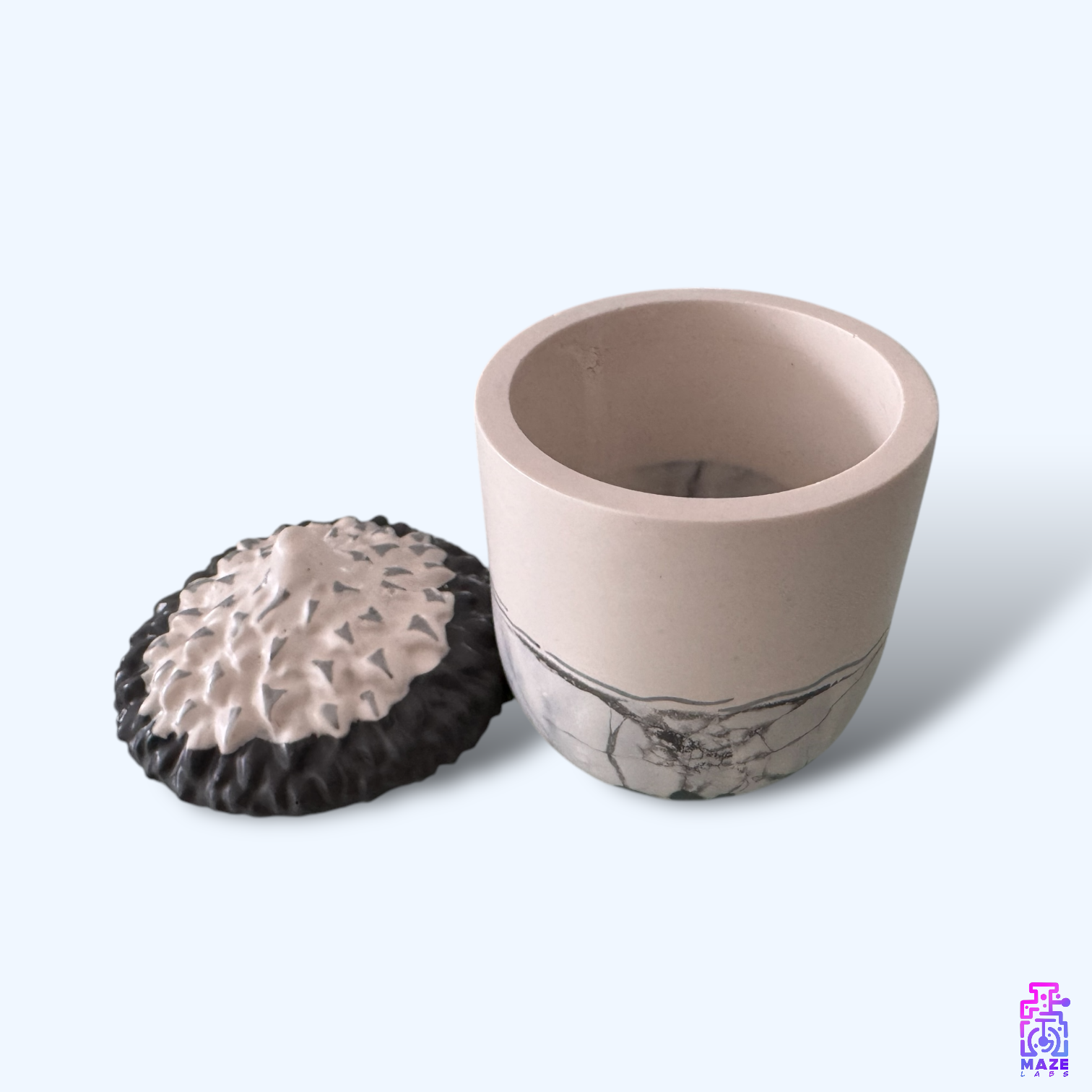 NOKT jar with the lid removed, showing its smooth interior for storing jewelry, keepsakes, or small essentials.