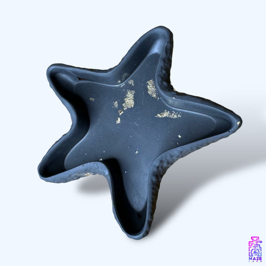 ORIX starfish tray made from eco-friendly jesmonite, featuring a dusty black finish with marbled details.