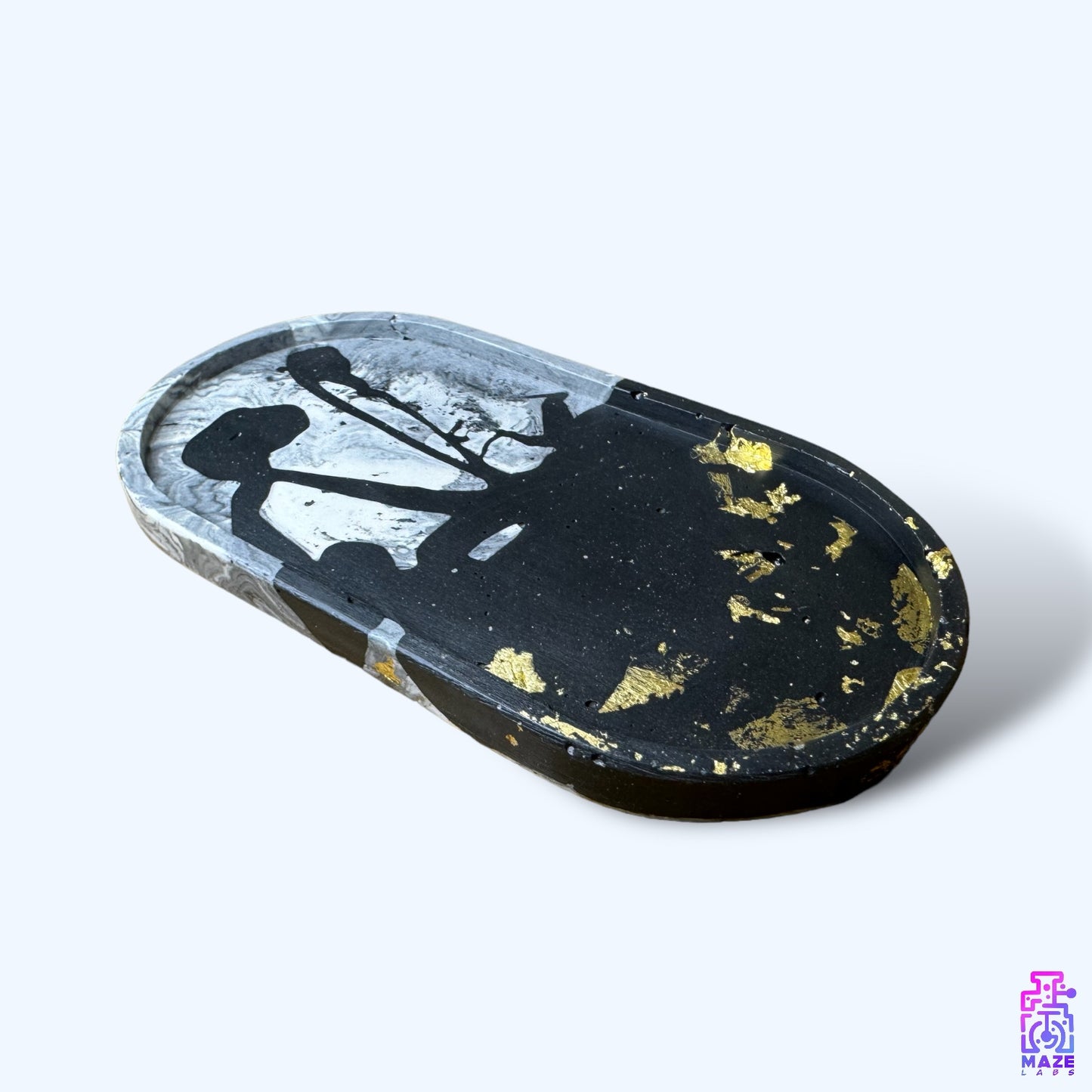 OVA tray with a sleek black and white abstract pattern, handcrafted in eco-friendly jesmonite.
