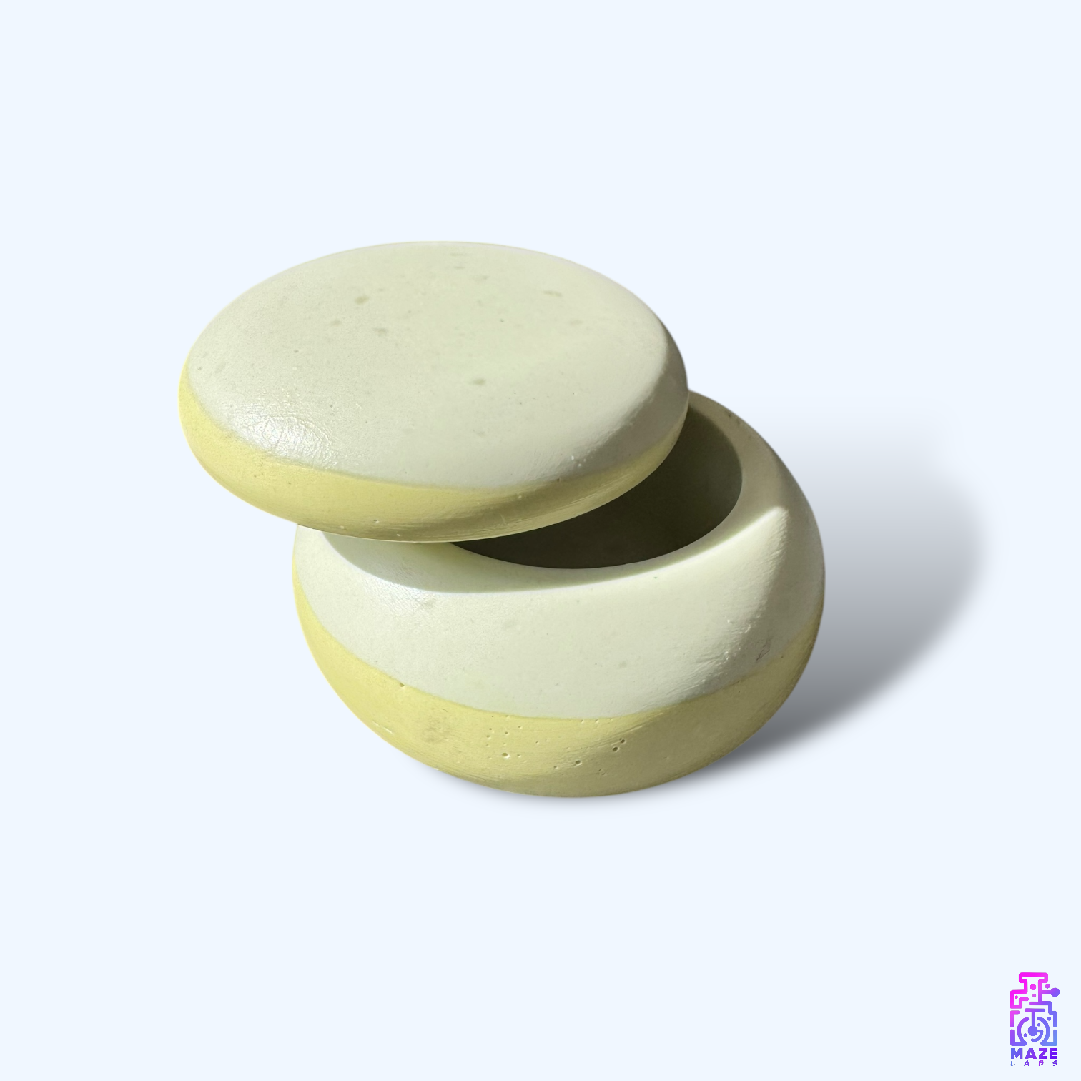 Minimalist Jesmonite storage jar with a modern design.