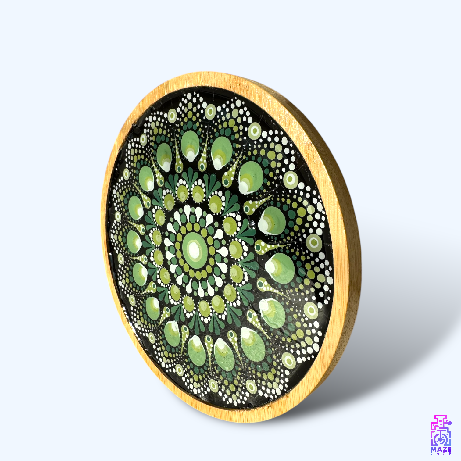 Side view of the ROOT wooden tray with a green mandala pattern, hand-painted and sealed with UV resin.